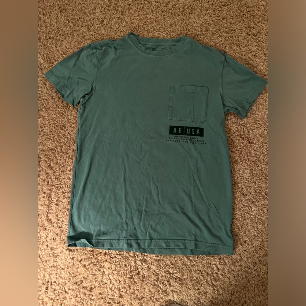 AE.  Size XS.  It’s like a sea green color.
